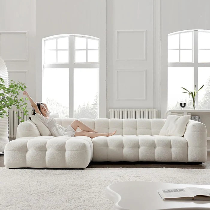 white tufted sectional sofa