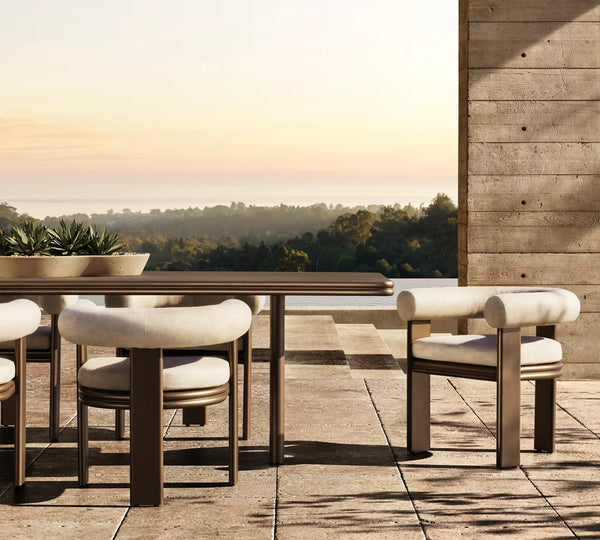 Moderno juego de comedor de aluminio para exterior: mesa contemporánea con sillones tapizados