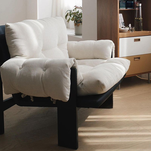 Sillón moderno capitoné – Sillón tapizado con estructura de madera negra