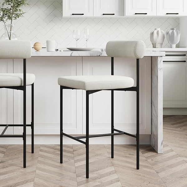 Taburete de bar minimalista moderno con tapizado, estructura de metal negro y respaldo cilíndrico.
