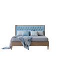 Bed with tufted headboard and pillows on a white background