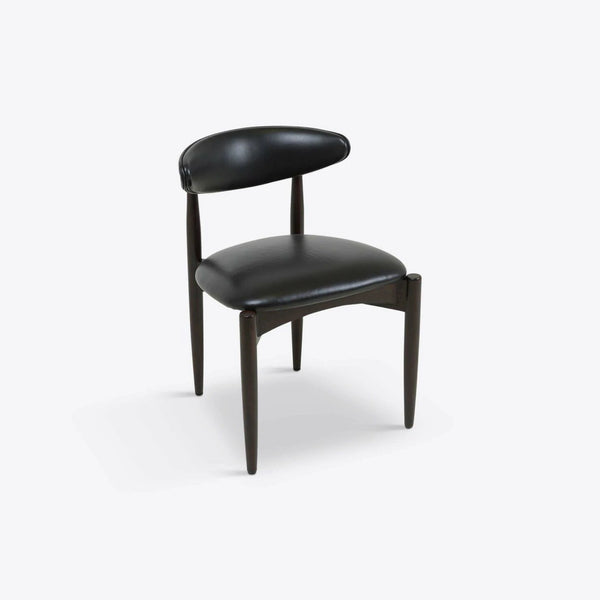 Silla de comedor moderna y escultural: elegancia contemporánea, madera maciza y cuero genuino
