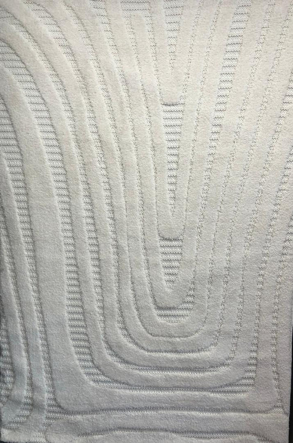 Alfombra moderna texturizada color crema con diseño de arco geométrico esculpido