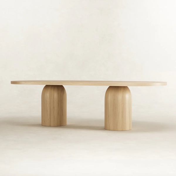 Mesa de comedor ovalada moderna y escultural de madera maciza con dos pedestales