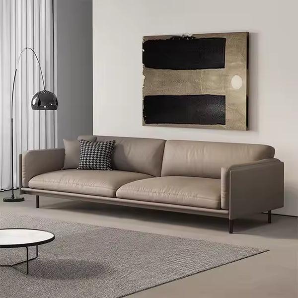 Sofá moderno de cuero color topo: un sofá minimalista de líneas elegantes