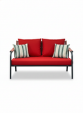 Powder coated aluminium outdoor sofa with handwoven rope arm detail