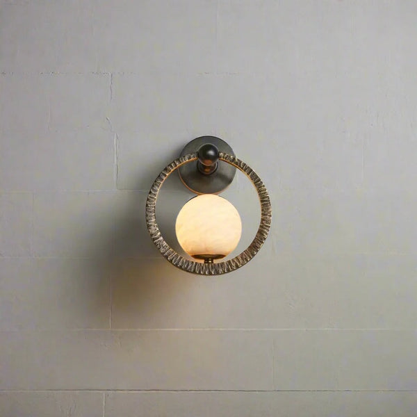 Alabaster Globe and Forged Iron Ring Wall Sconce