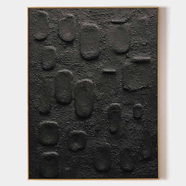 Black Pebbles in Textured Relief