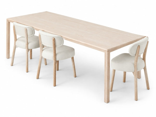 The Chablis Dining Table on a white studio background