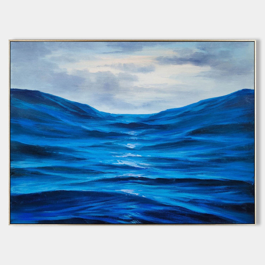 Cobalt Sea Under Silver Clouds