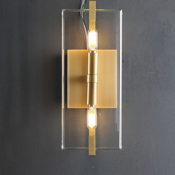 Compact Geometric Brass Wall Sconce with Floating Crystal