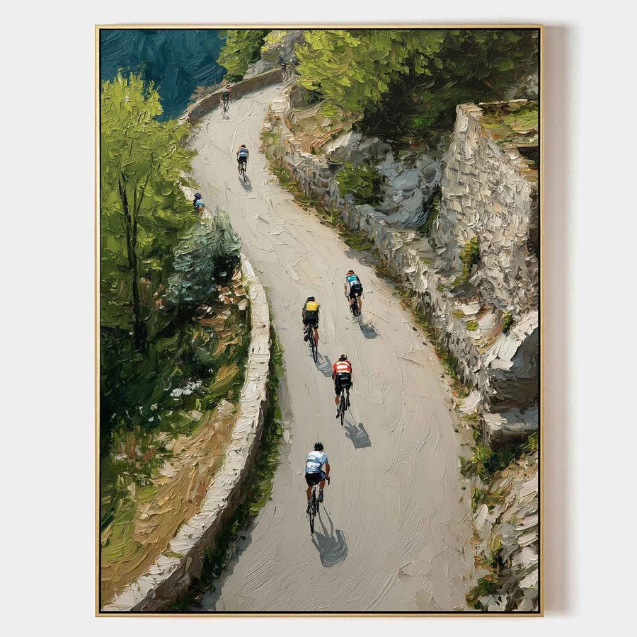 Cyclists Climbing a Winding Mountain Road