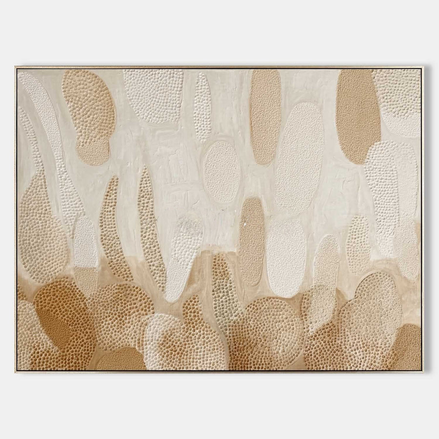 Dotted Pebbles in Warm Sand