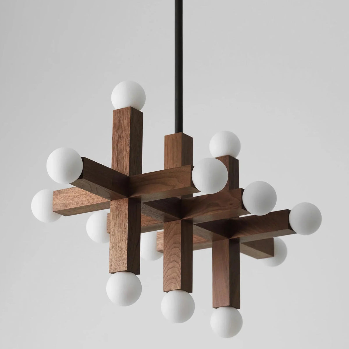 Interlocking Walnut Beam and Opal Globe Chandelier