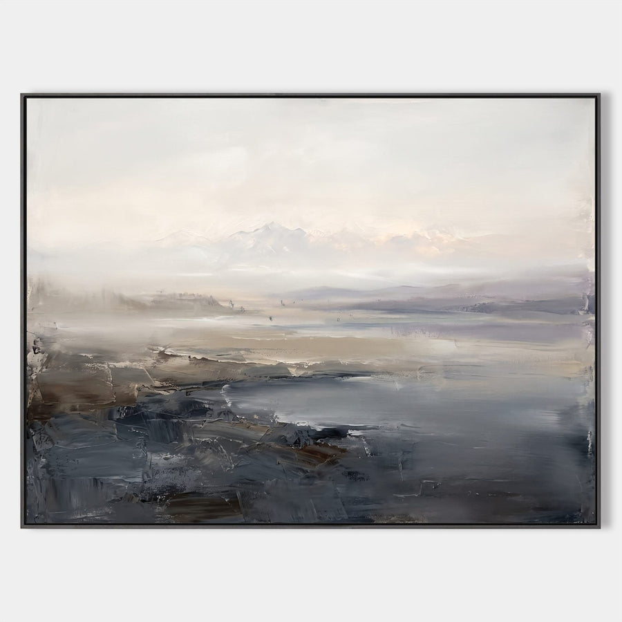 Misty Shoreline Beneath Pale Mountains