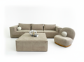 Cream modular sectional sofa and ottoman side angle view