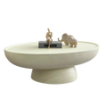 Modern minimalist pedestal coffee table with wide stone-look matte top and sculptural base 120x65x28cm front view