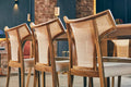 Modern Sculptural rattan Back Dining Chair - Room Setting