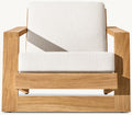 Alicia solid teak outdoor armchair styled on terrace with cushions
