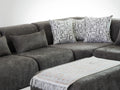 Otto L-shaped sectional sofa with oversized ottoman close-up
