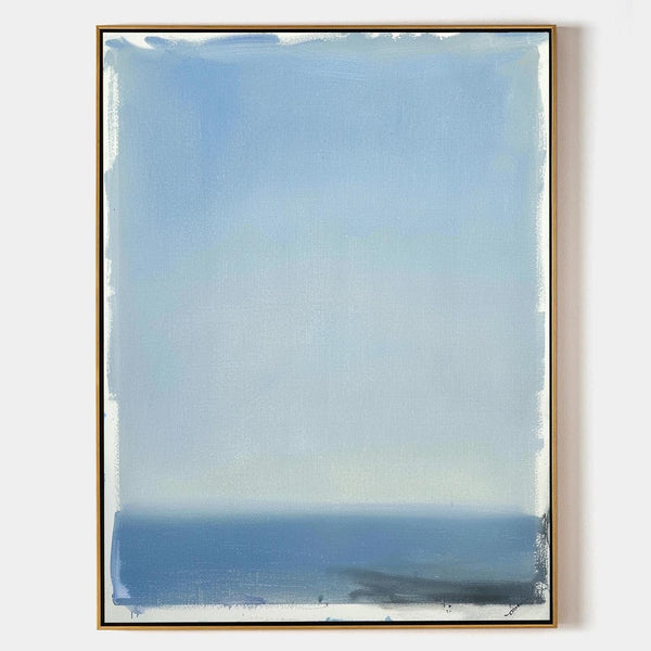 Pale Blue Horizon Over Still Water