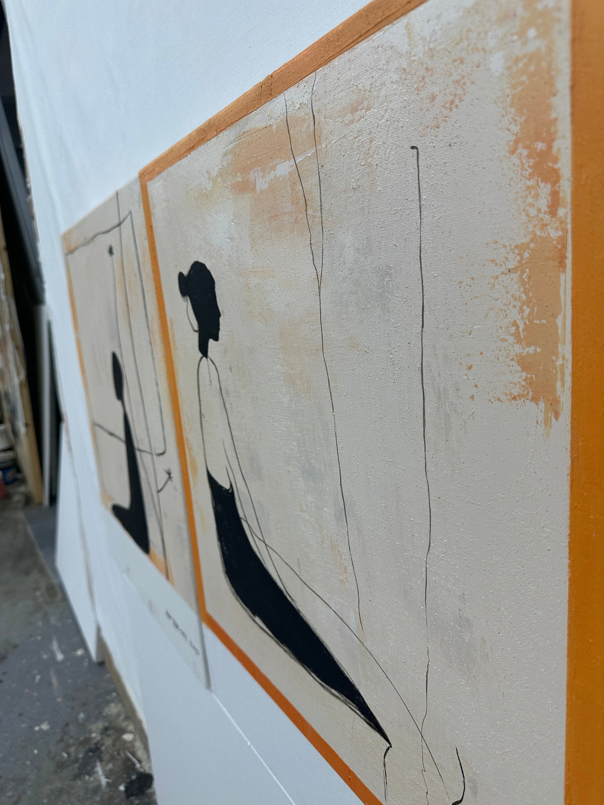 Quiet Figures in Ink and Ochre
