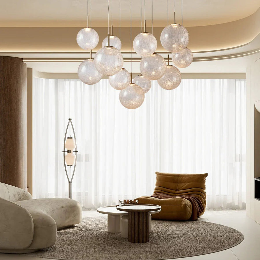 Staggered Blown Glass Globe Cluster Brass Chandelier