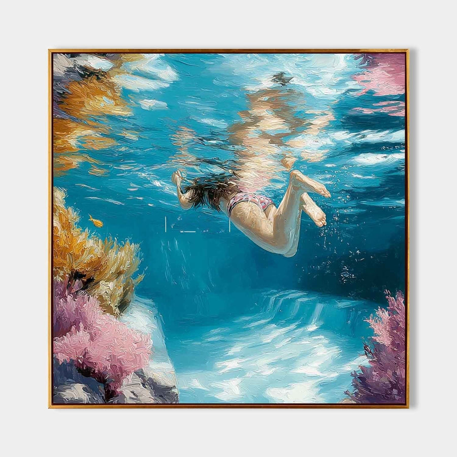 Swimmer Beneath Sunlit Coral Waters
